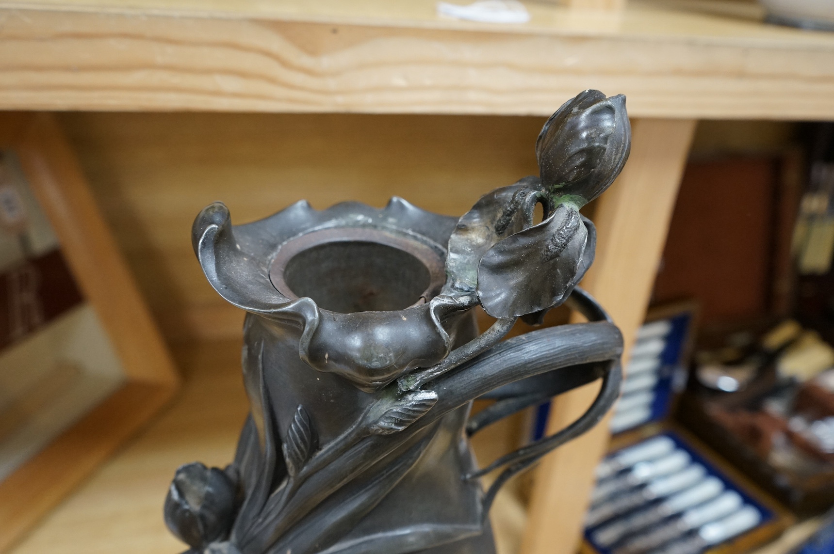 An Art Nouveau large pewter ewer, singed W. Herring, 47cm tall. Condition - poor